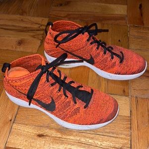 Nike flyknit chukka orange and black, size 10.5